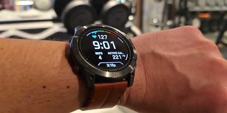 Mid-workout in the gym, heart rate keeping up